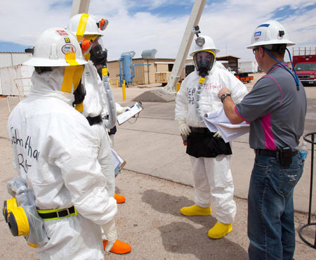 Workers wearing protective clothing